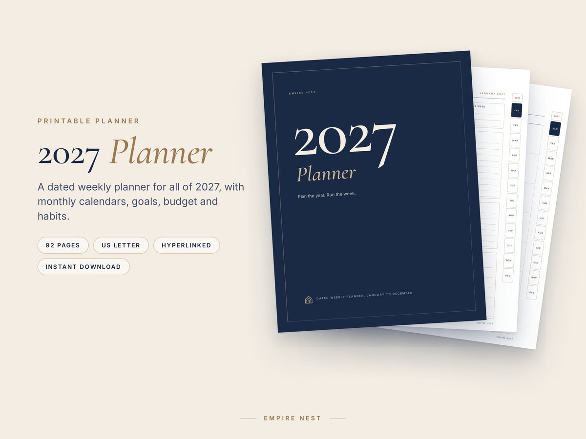 2027 Planner by Empire Nest: navy cover in front of a weekly page and a monthly calendar
